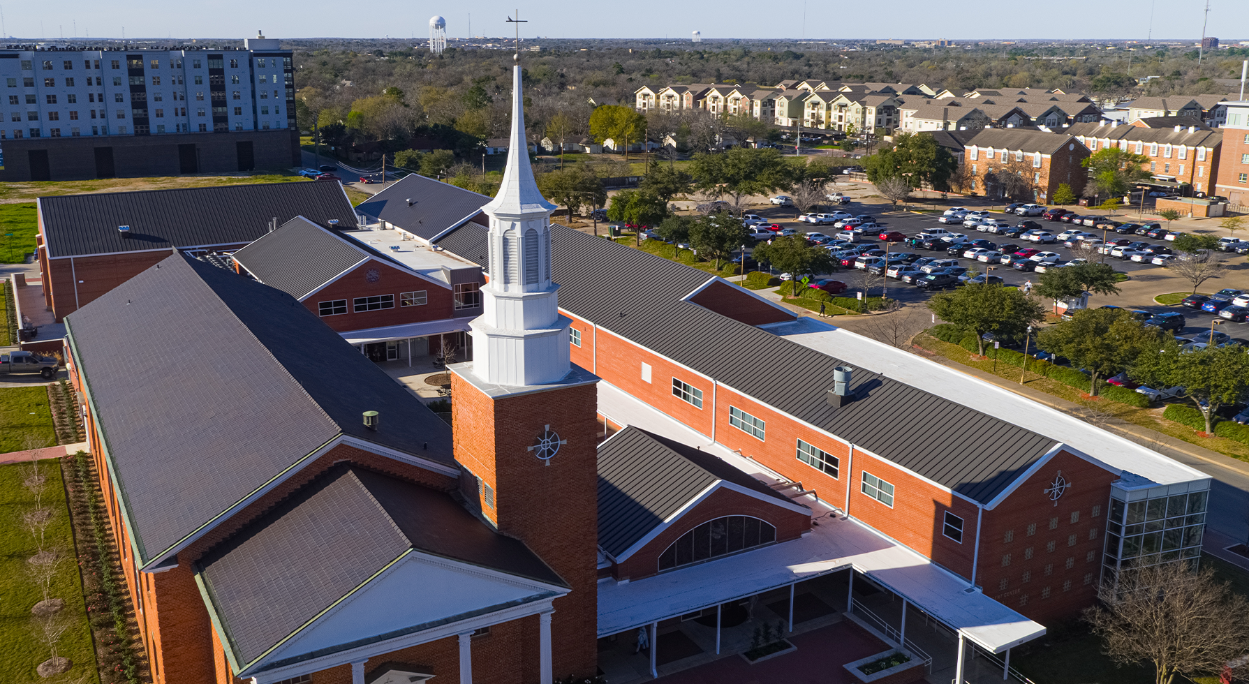 Elevated view of a commercial roof design and build by Schulte Roofing® in San Antonio.