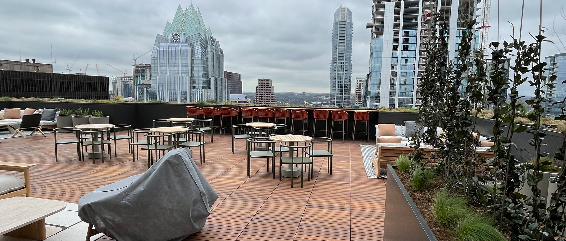 Custom water management system with tapered insulation and flashings integrated into the 600 Congress rooftop by Schulte Roofing.