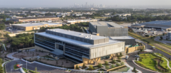 Texas Department of Public Safety campus with Austin skyline in the background. Flat commercial roofing completed by Schulte Roofing.